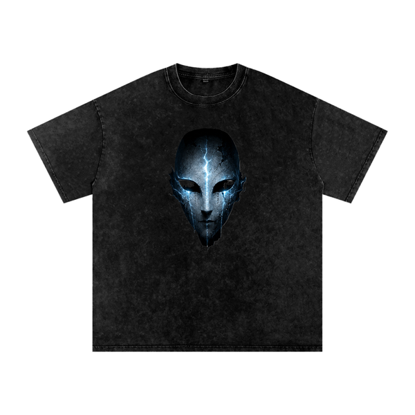 Void Sentinel Snow Wash Tee in Black — front view showing cracked spirit mask chest graphic with cold blue glowing eye sockets on washed oversized cotton tee