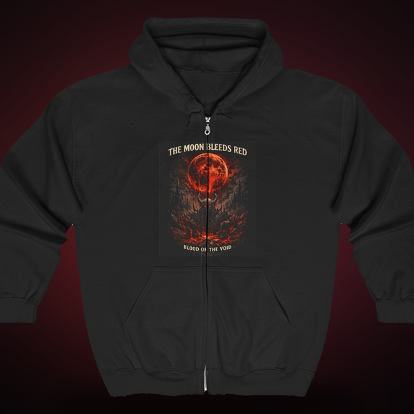 The Moon Bleeds Red — the blood-moon 'Blood of the Void' chest print on a black full-zip hoodie, relic-lit. An artifact of The Forgotten. VoidForge Apparel.
