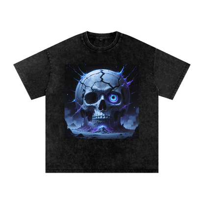 The Blind God Tee in Black — front view showing ancient cosmic skull with single galaxy eye and cold blue lightning on premium snow washed oversized dark fantasy tee