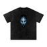 Void Sentinel Snow Wash Tee in Black — front view showing cracked spirit mask chest graphic with cold blue glowing eye sockets on washed oversized cotton tee