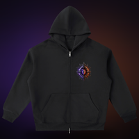 The World Eater — front: the split-eye sigil at the chest on a black full-zip hoodie, relic-lit. VoidForge Apparel.